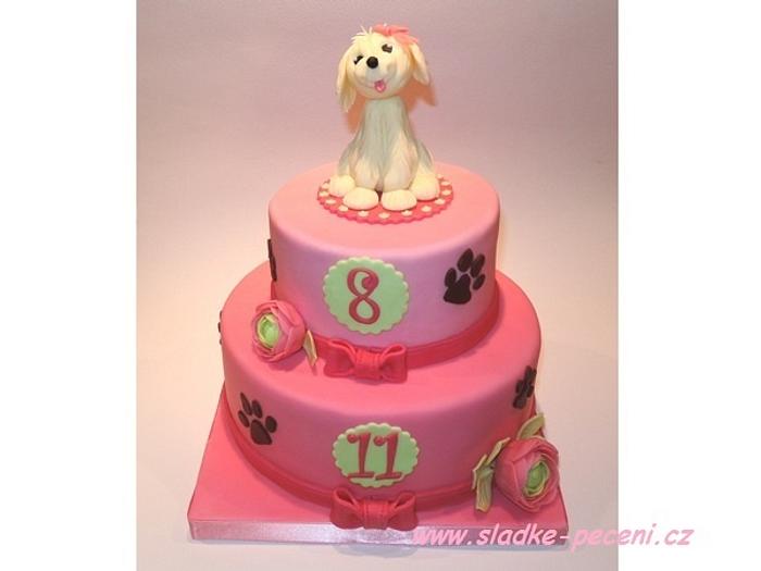 Pink cake with dog