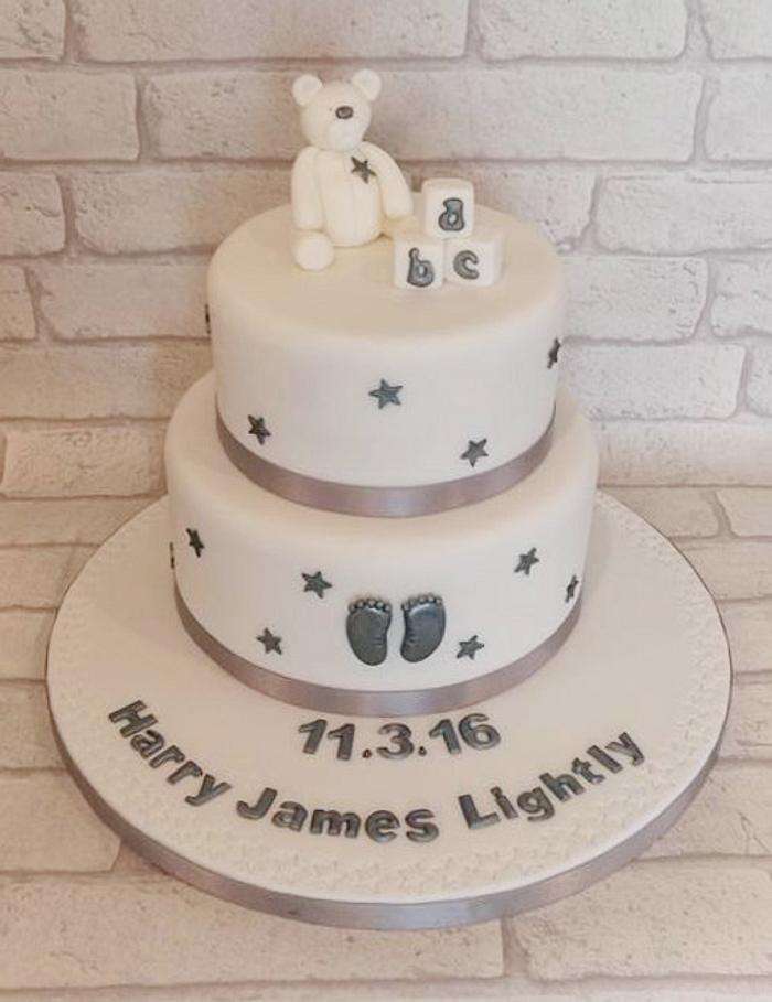 White and silver christening cake