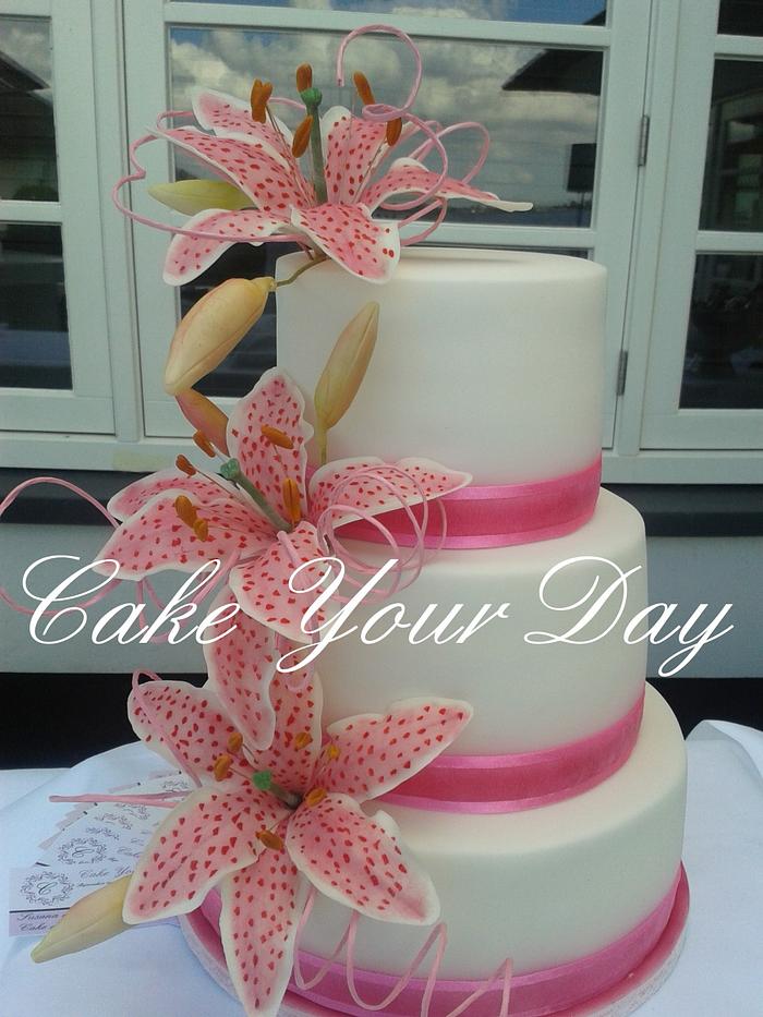 Pink lilies Wedding Cake.