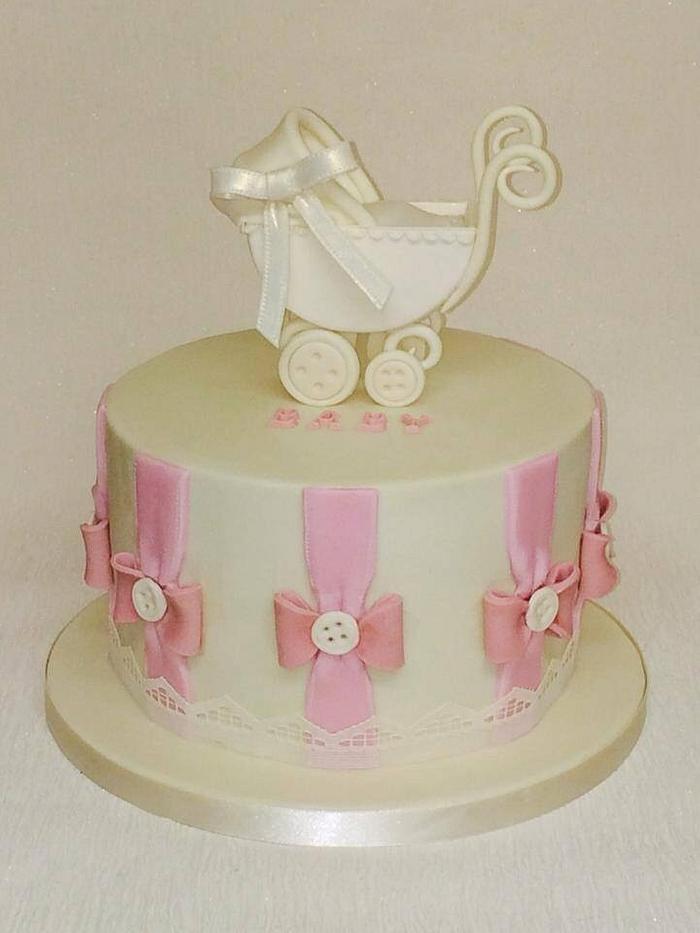 Vintage pink baby shower cake