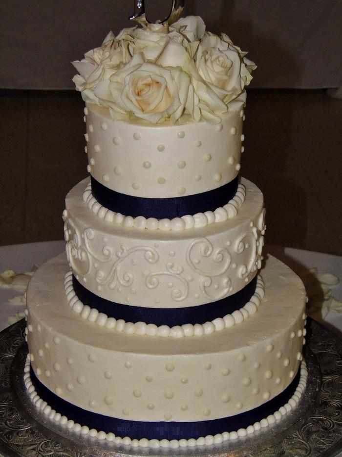 White and navy wedding cake buttercream