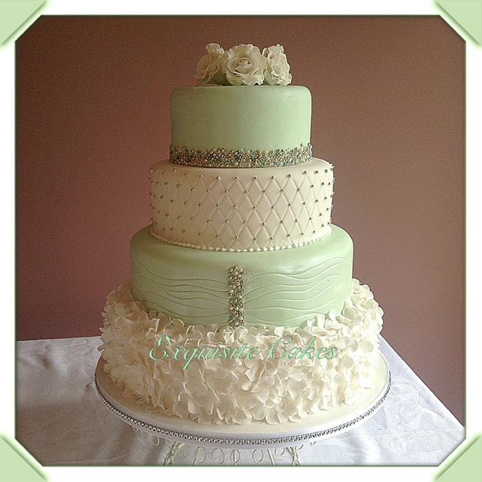 Mint and white wedding cake