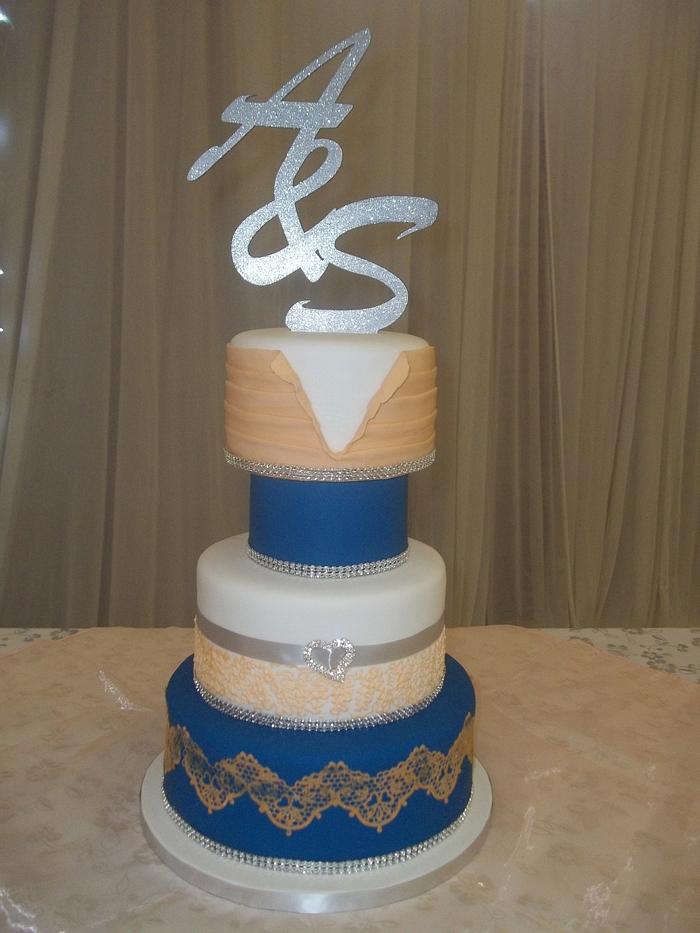 Royal blue and peach wedding cake