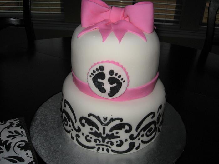 Pink and black baby shower cake