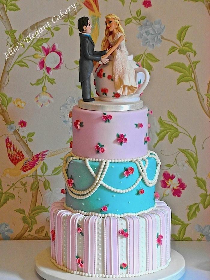 vintage wedding cake with an Alice in wonderland theme :)