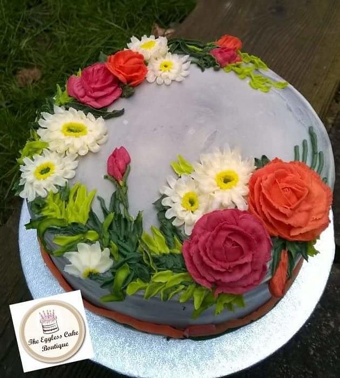 Fresh cream cake decorated with buttercream flowers