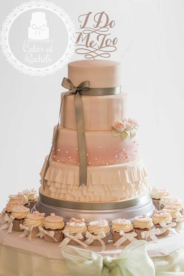 Four tier blush pink and moss green wedding cake