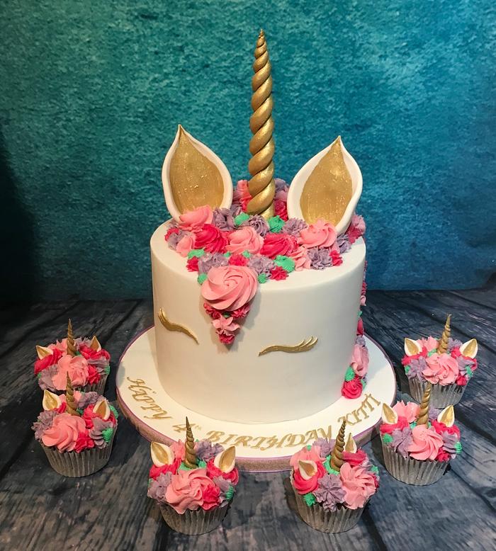 Pink unicorn cake and cupcakes