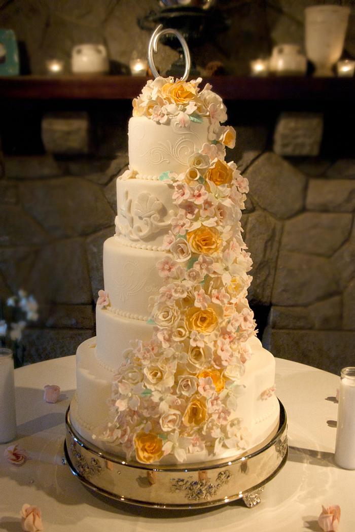 Sugar Flower cascade on this wedding cake. 