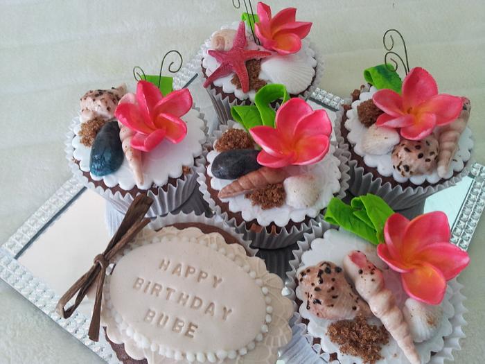 Cupcakes with Frangipani and sea shells ...