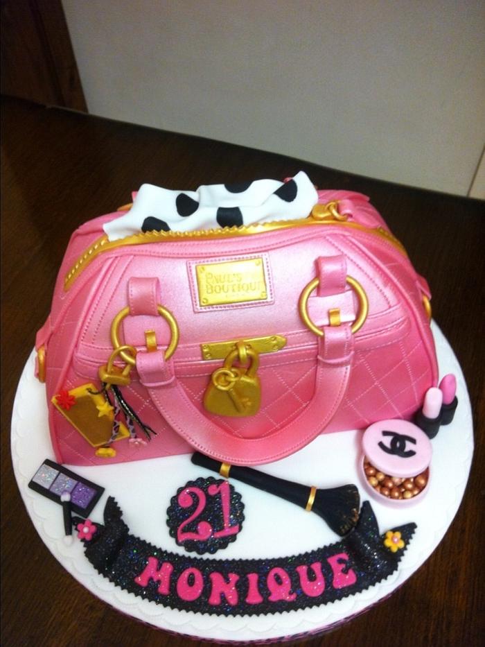 Pink pauls boutique handbag with cosmetics