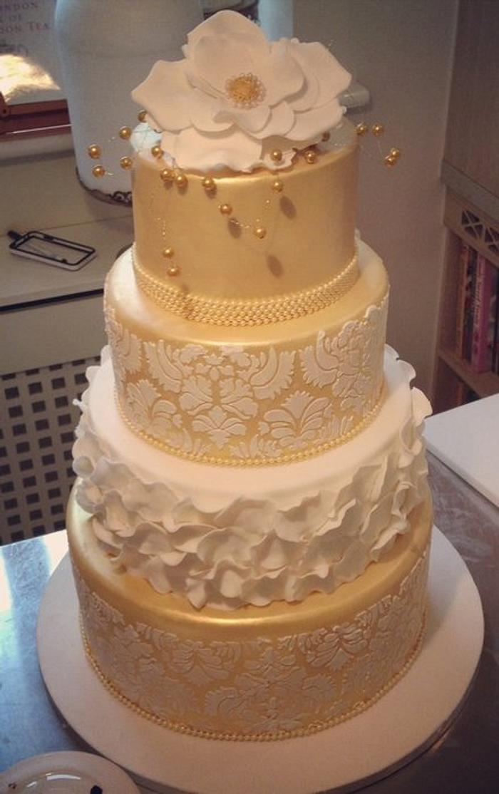 damask gold cake with ruffle rose petals