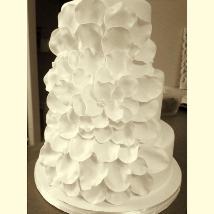 White flower petal wedding cake