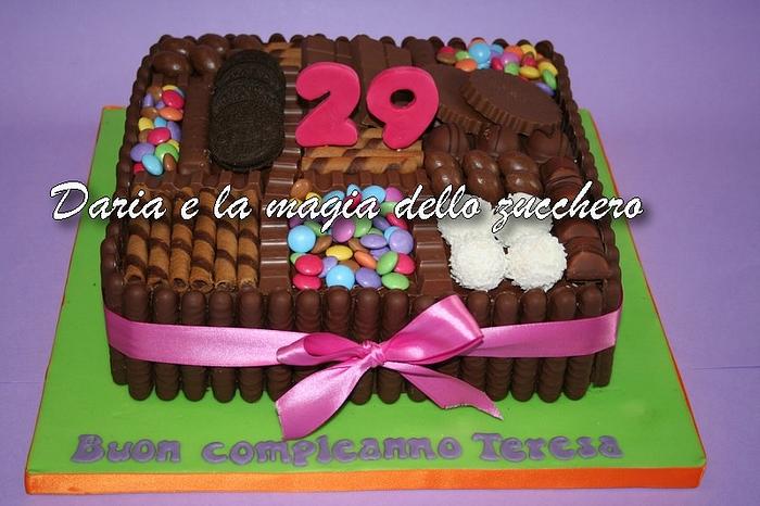 cake with chocolates and biscuits