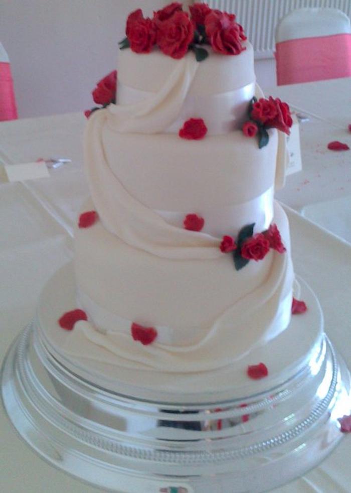 Roses and drapes Wedding Cake