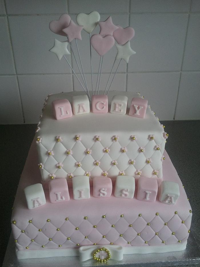 Pink and white christening cake
