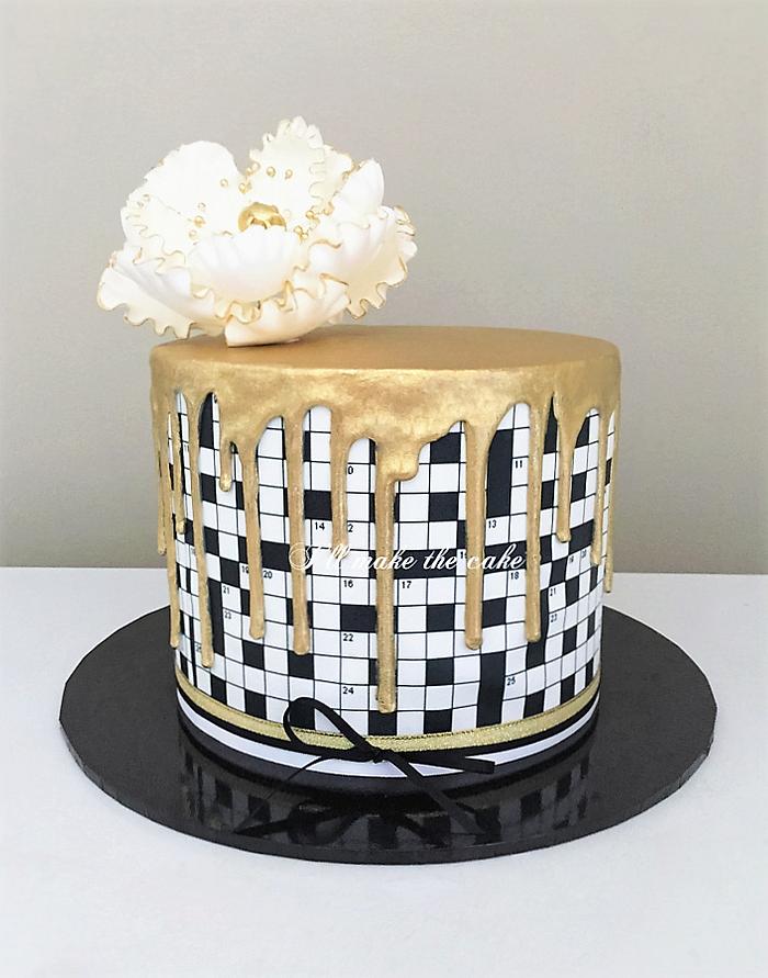 Gold crossword cake.