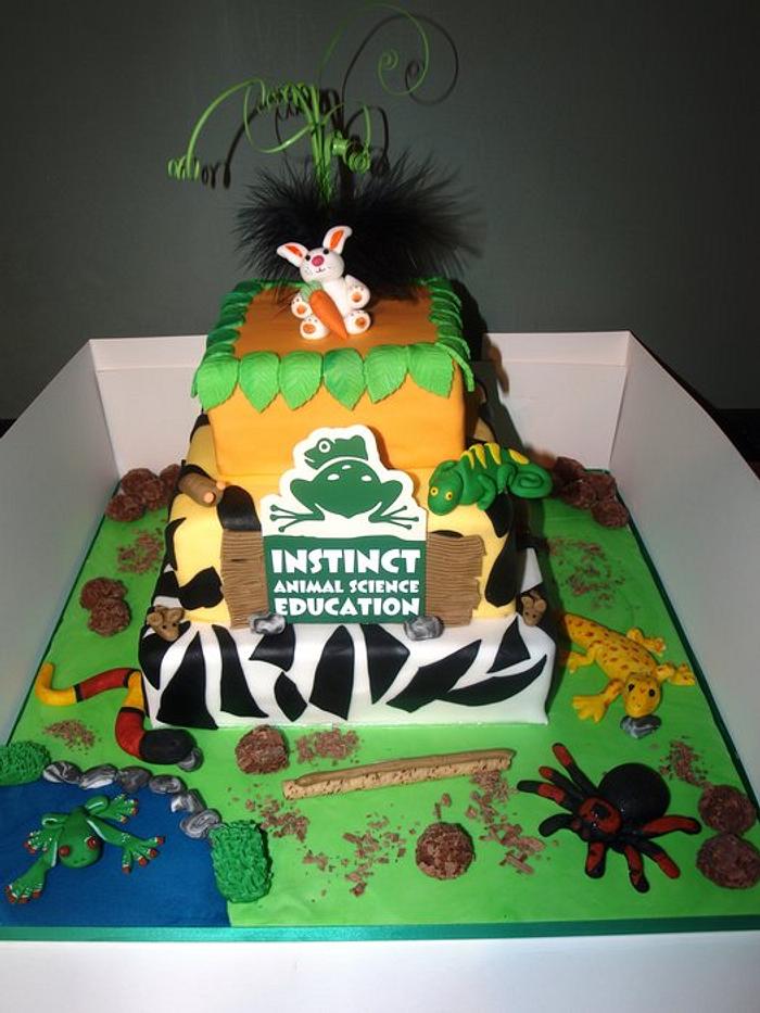 Insect and reptile theme cake