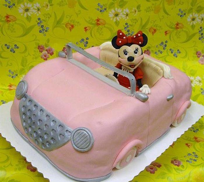 Minnie Mouse in the car.