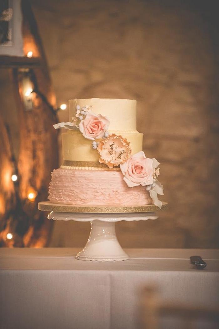 Buttercream and pink ruffle wedding cake