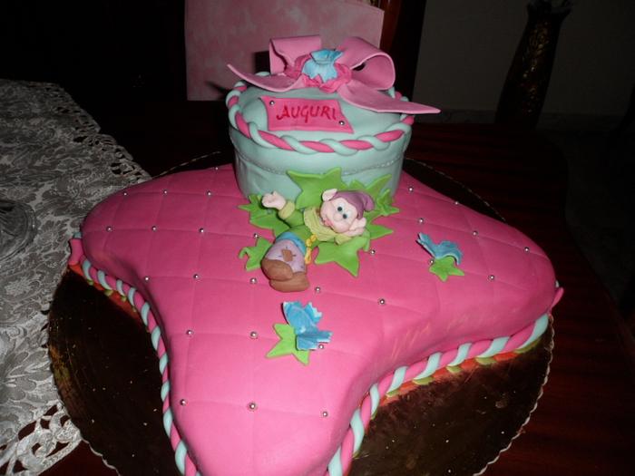 cake with puppy, pillow and box