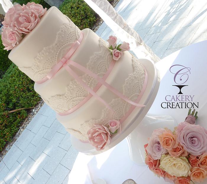 Pale pink lace wedding cake