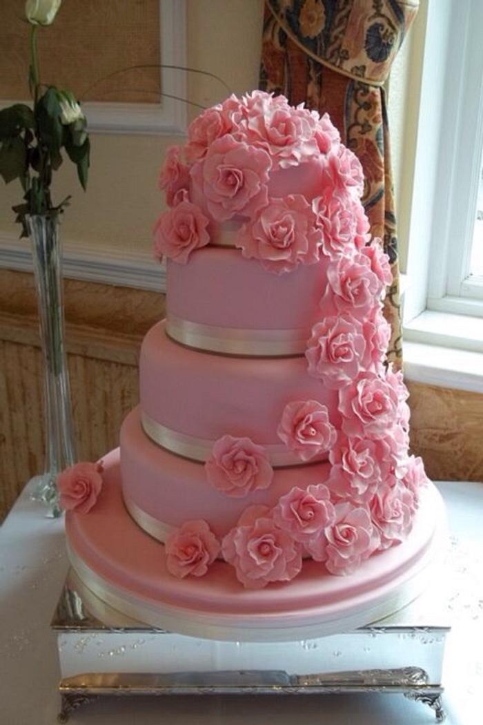Pink roses 4 tier wedding cake