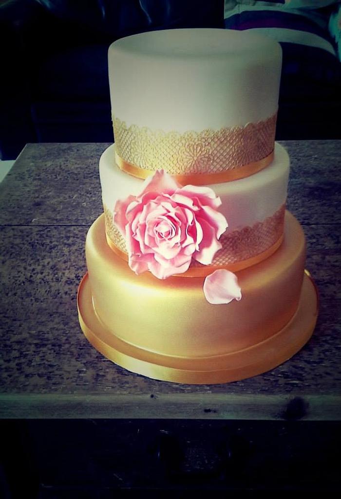 Golden Cake with iced rose
