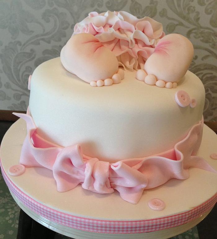 Cute pink baby shower cake