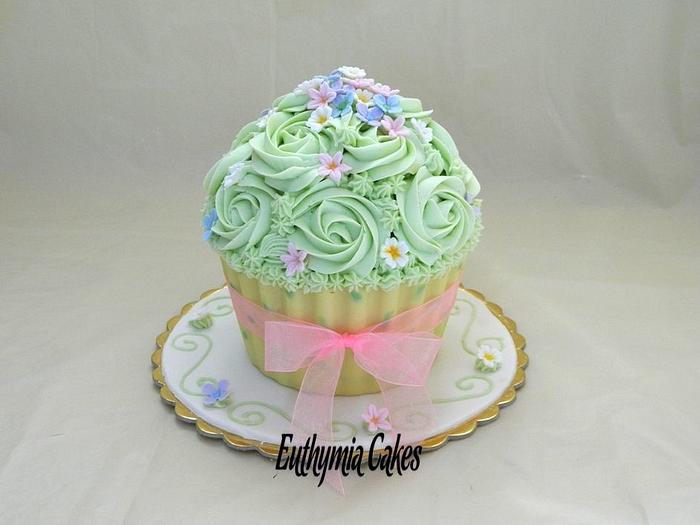 Mother's Day giant cupcake in pastel colours and polka dots chocolate shell