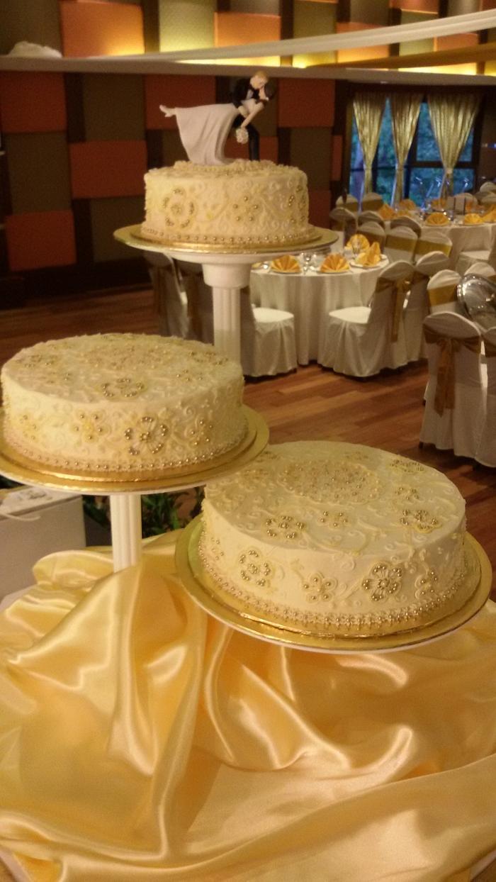 Ivory N gold wedding cake