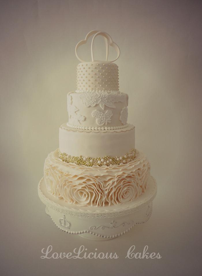 Ivory ruffle wedding cake