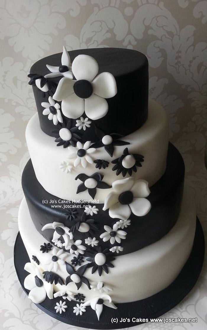 Four Tier Black and White Blossoms Wedding Cake
