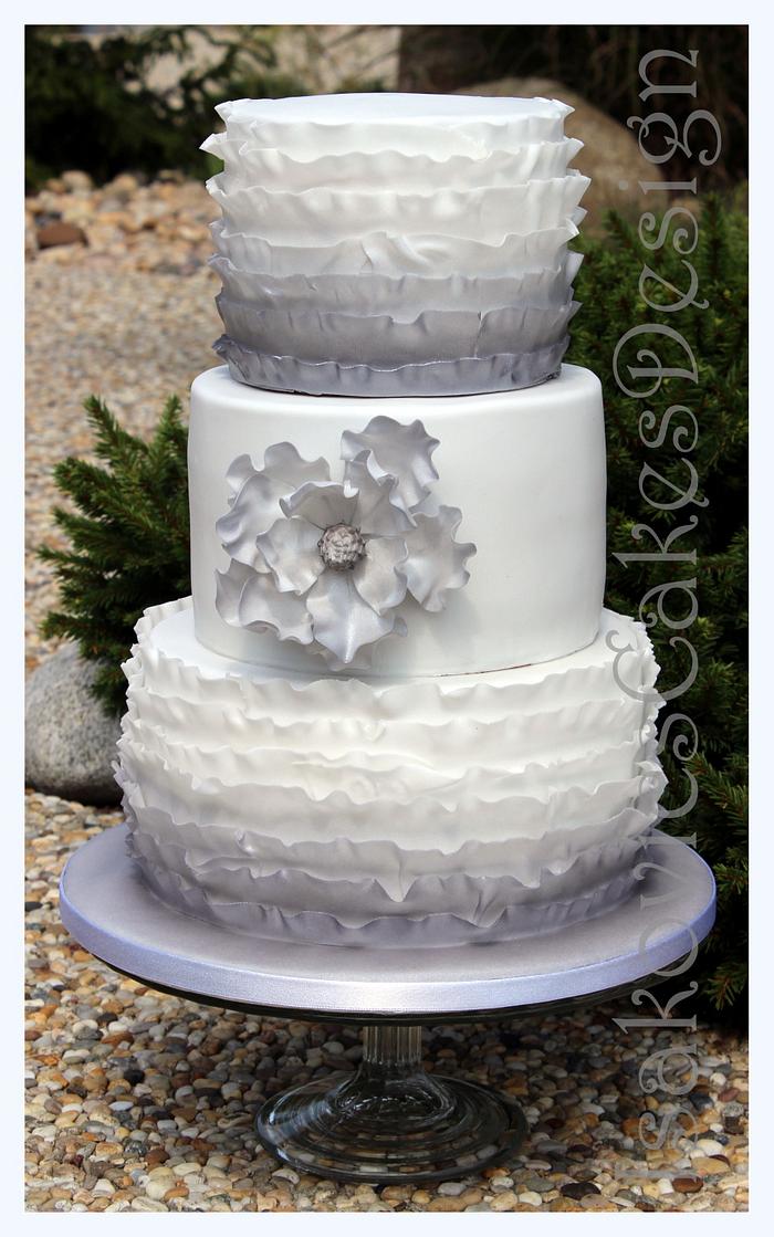white and silve ruffle wedding cake