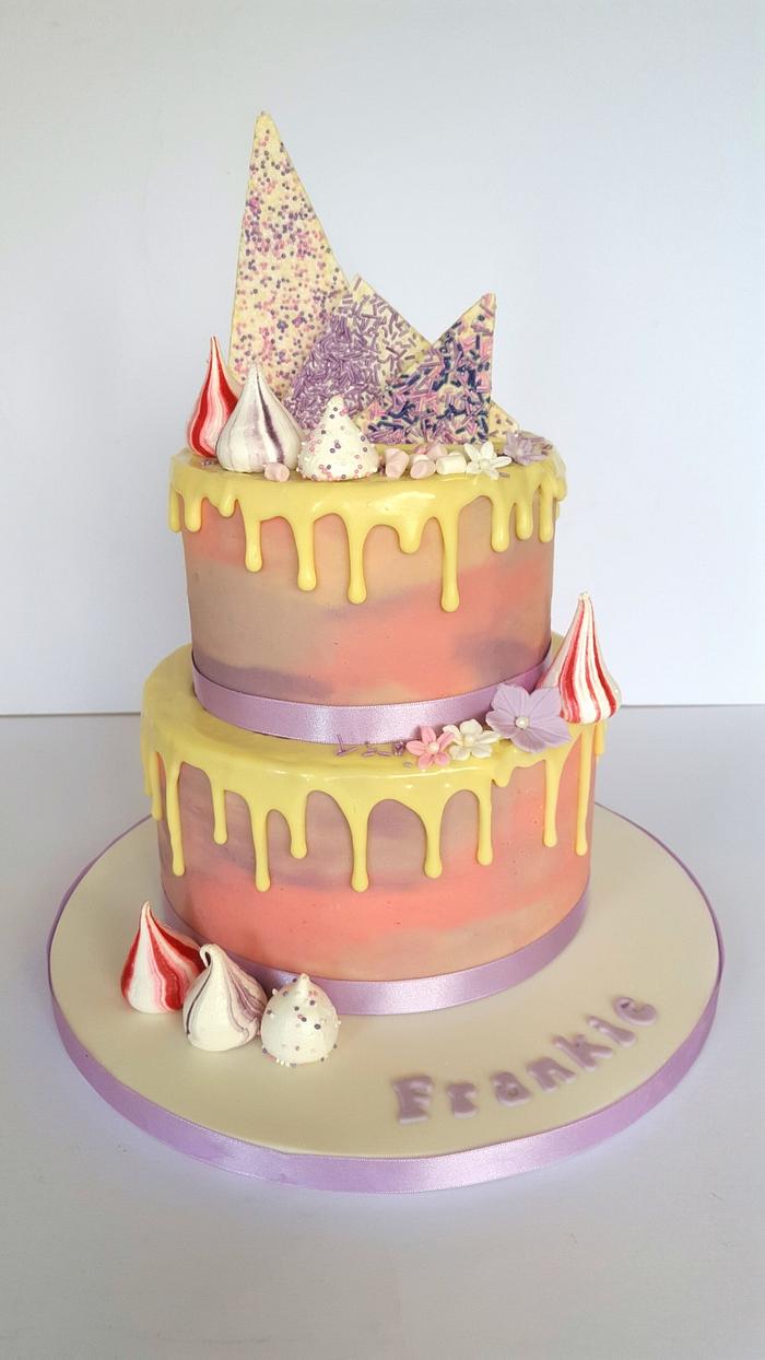 Pastel pink and purple drop cake.