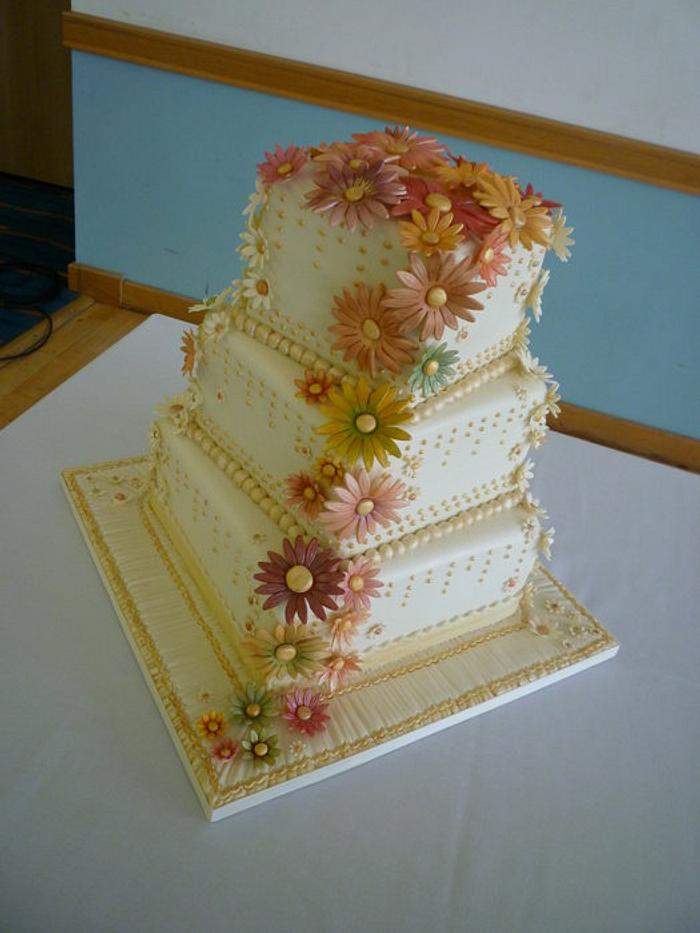 Autumnal Cascading Daisies Wedding Cake