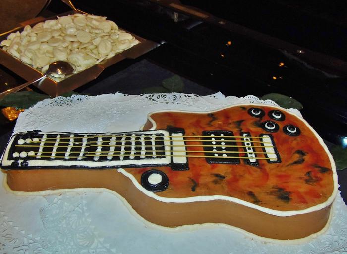 Guitar buttercream shaped cake