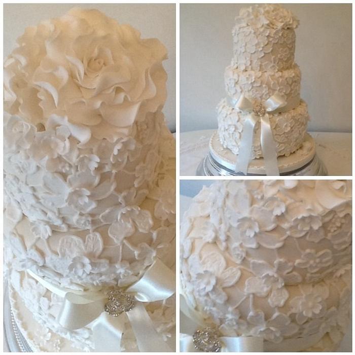 Three tier textured lace wedding cake 