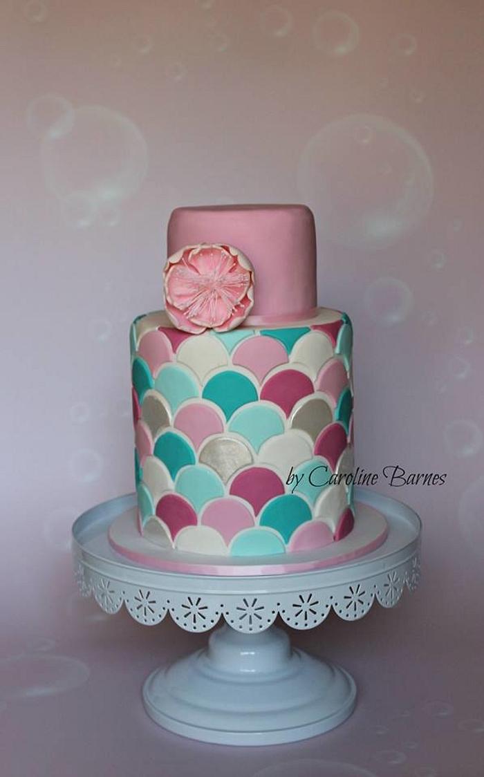 Double barrel cake with scales pattern