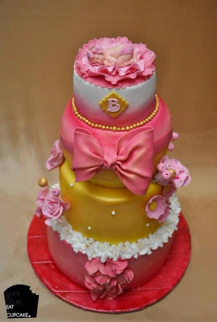 Pink cake for a newborn baby girl