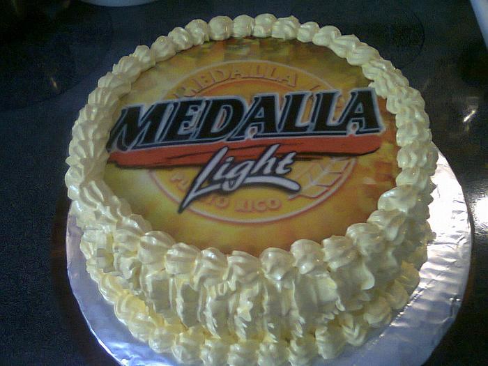                   Medalla Beer Fondant Topper Birthday Cake
