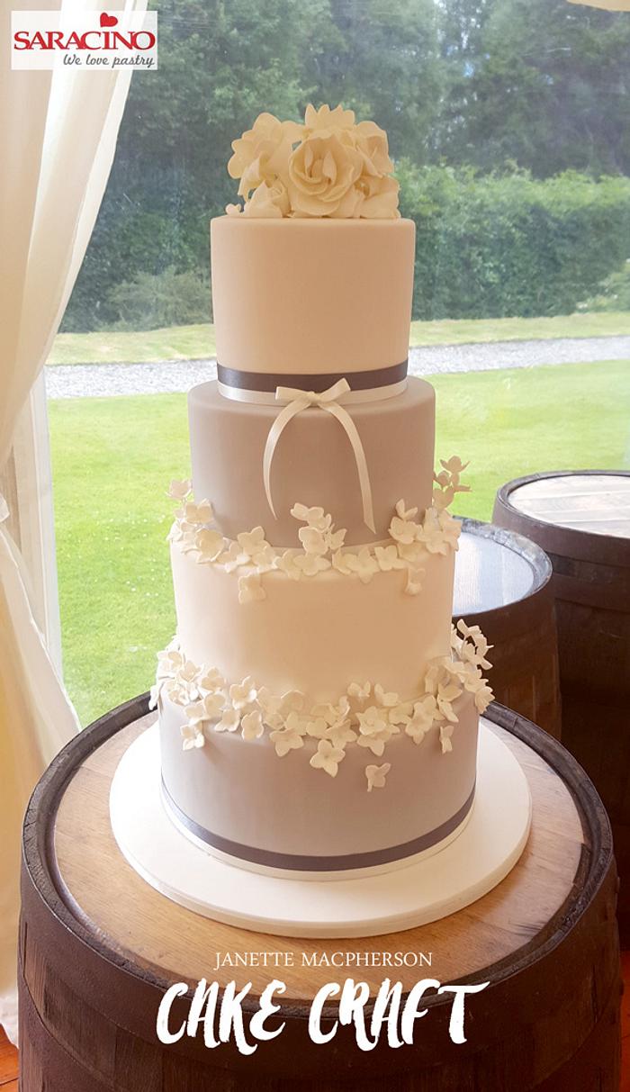 4 tier grey/white wedding cake