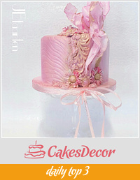 Pretty pinky small cake in wafer decor