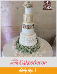 Vertical ruffles and rose wedding cake 