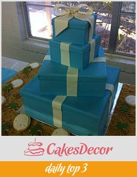 Tiffany Box Wedding Cake with sand dollar and palm tree cookies in edible sand