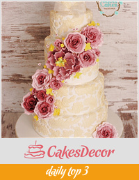 Lace and roses wedding cake