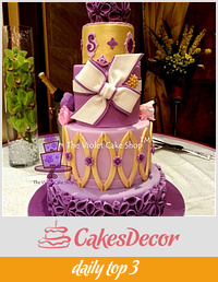 Purple and Gold 4 Tier Wedding Cake Venue Shot - The Violet Cake Shop