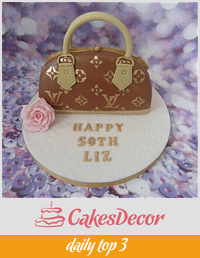 Louis Vuitton handbag cake.