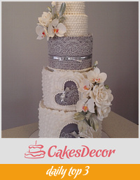 Wedding cake with orchids and roses ...