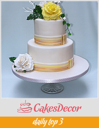 Small wedding cake with yellow rose